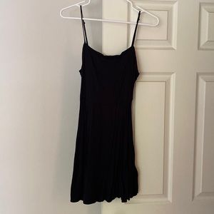 Black mini dress. Open back.